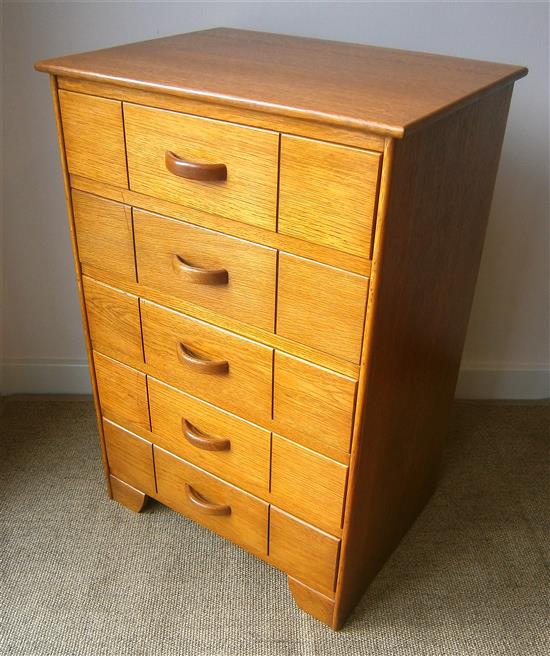 A Heals style golden oak five drawer chest W.56cm